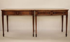 Pair of modern serpentine-fronted two-drawer hall tables, on square section tapering supports to