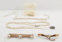 Gold bar brooch set with three pearls, marked K15, a gold bar brooch in the form of mistletoe set