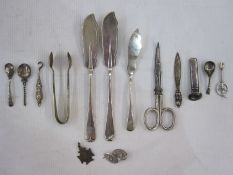 Quantity small silver items including bookmark, flower holder, sugar tongs, butter knives,