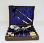 EPNS canteen with bone-handled knives, setting for six, to include carving set, brass label dated