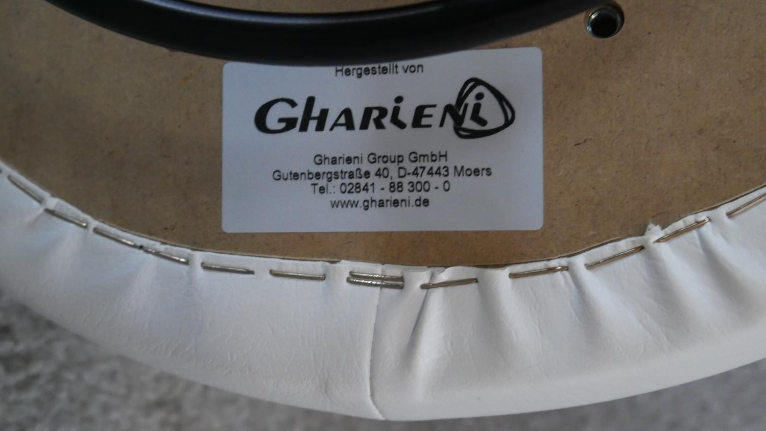A pair of adjustable white vinyl stools on aluminium bases on casters. Makers label to the - Image 2 of 3