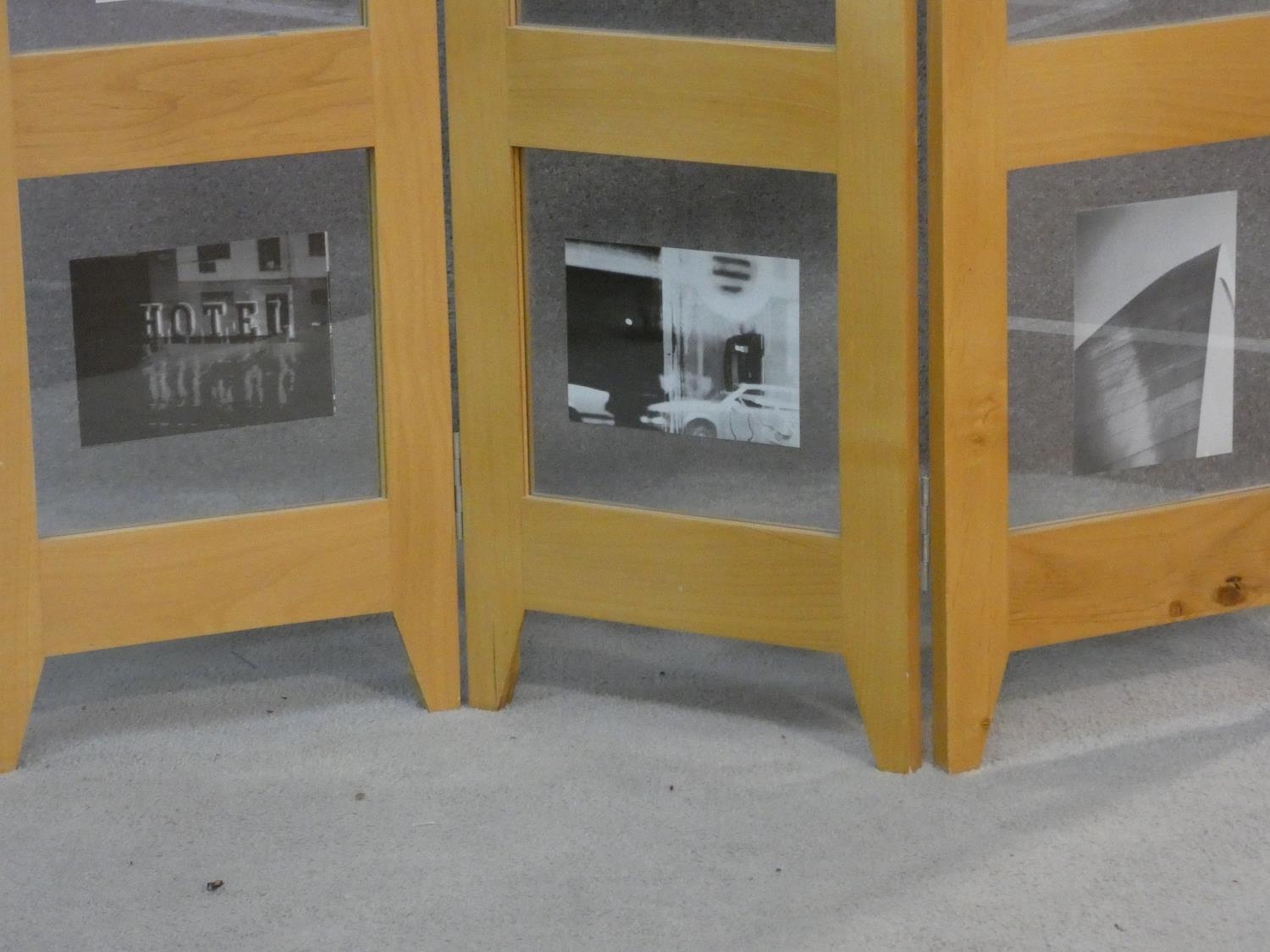 A floor standing two fold three panel screen fitted with glazed photograph window panes. H.177 L. - Image 4 of 6