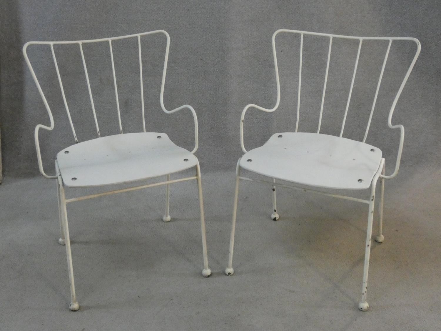 A pair of C.1950 Ernest Race antelope chairs, seats in moulded and laminated plywood. H.80cm