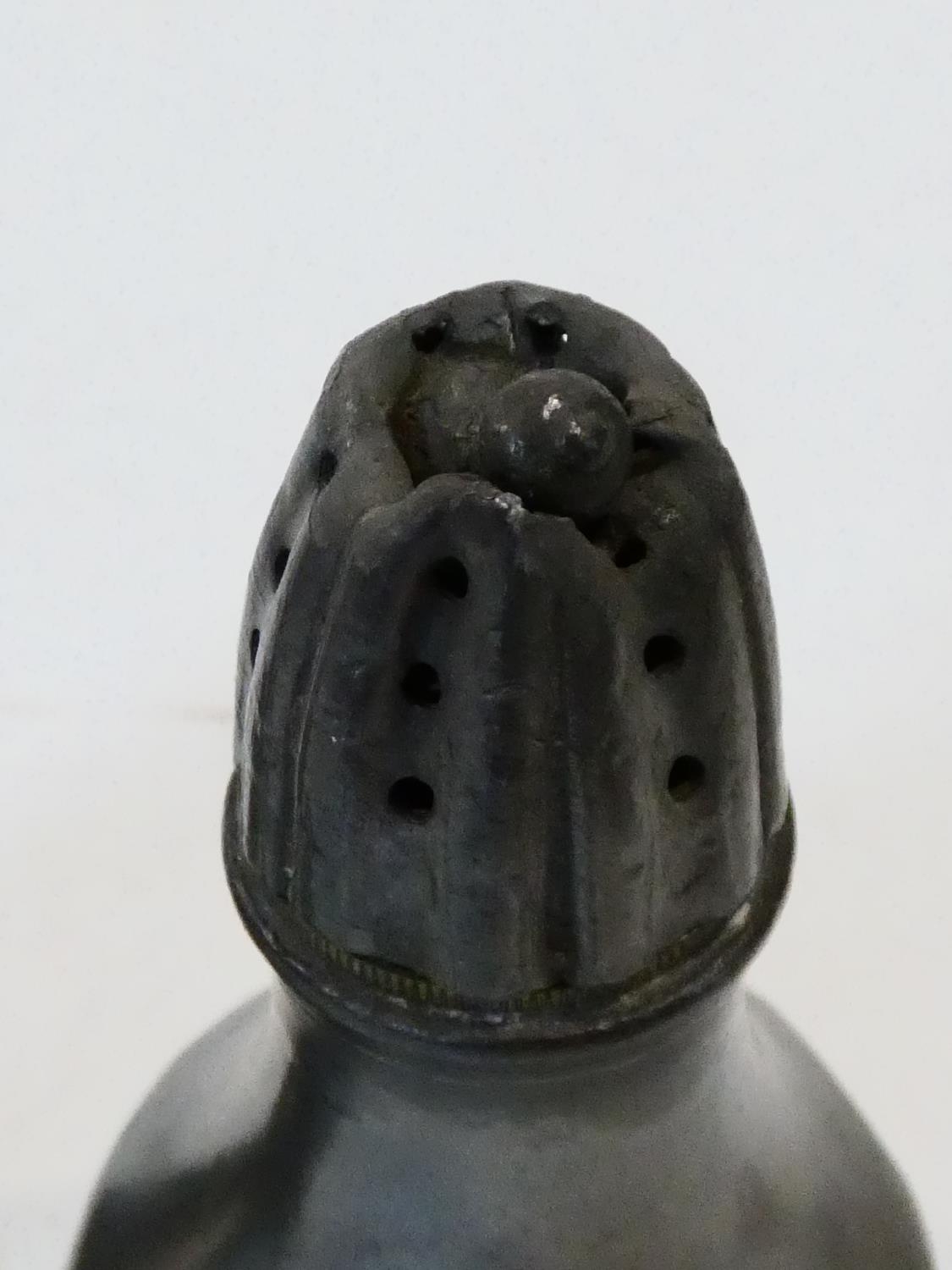 A collection of antique pewter items. Including plates, measures, pepper shaker, jug and tankards. - Image 27 of 27