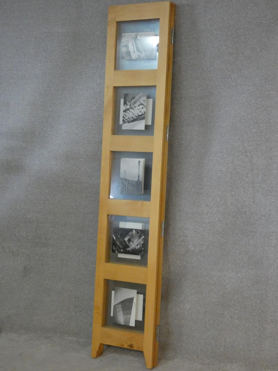 A floor standing two fold three panel screen fitted with glazed photograph window panes. H.177 L. - Image 5 of 6