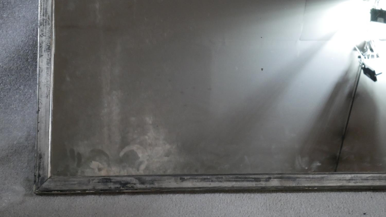 A very large vintage studio mirror in distressed painted metal frame. H.109 W.299cm - Image 2 of 5