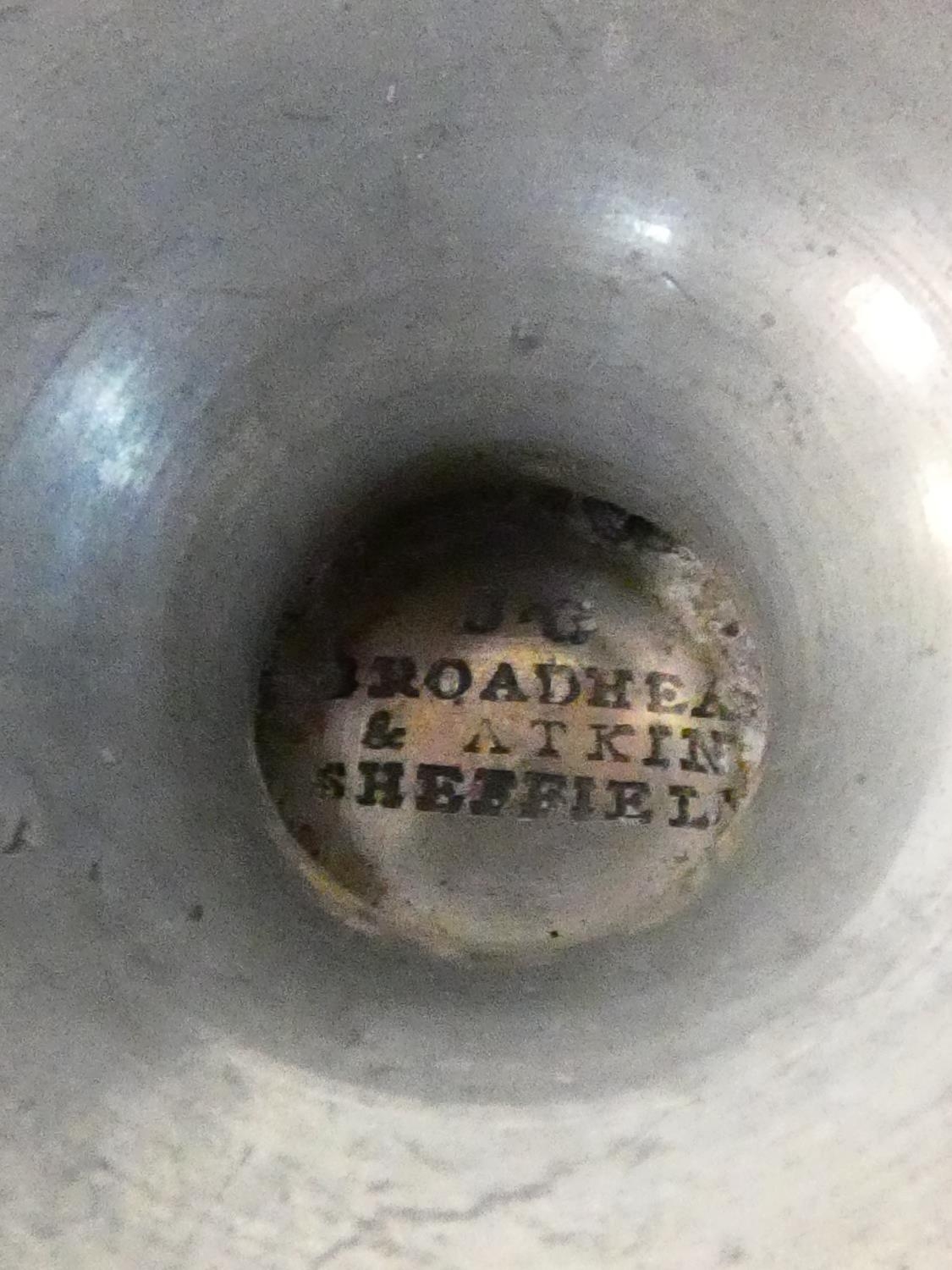 A collection of antique pewter items. Including plates, measures, pepper shaker, jug and tankards. - Image 17 of 27