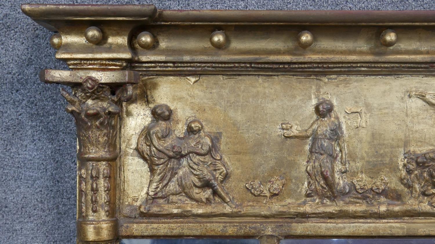 A Regency gilt overmantel mirror with ball decorated architectural cornice above frieze with - Image 2 of 6