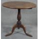 A Georgian oak tilt top table on baluster pedestal tripod supports. H.75cm (top in need of some - Image 1 of 4