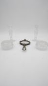 A collection of dressing table items. Including a pair of cut crystal candlesticks, two cut