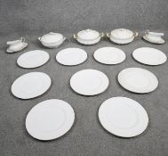 A Royal Standard fine bone china white and gilded part dinner service. Including large dinner