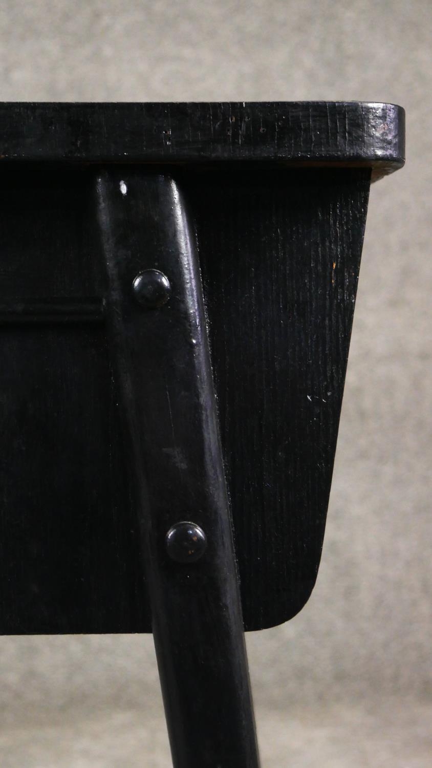 A retro vintage ebonised magazine table on splay supports. H.69 W.62 D.39cm - Image 3 of 4