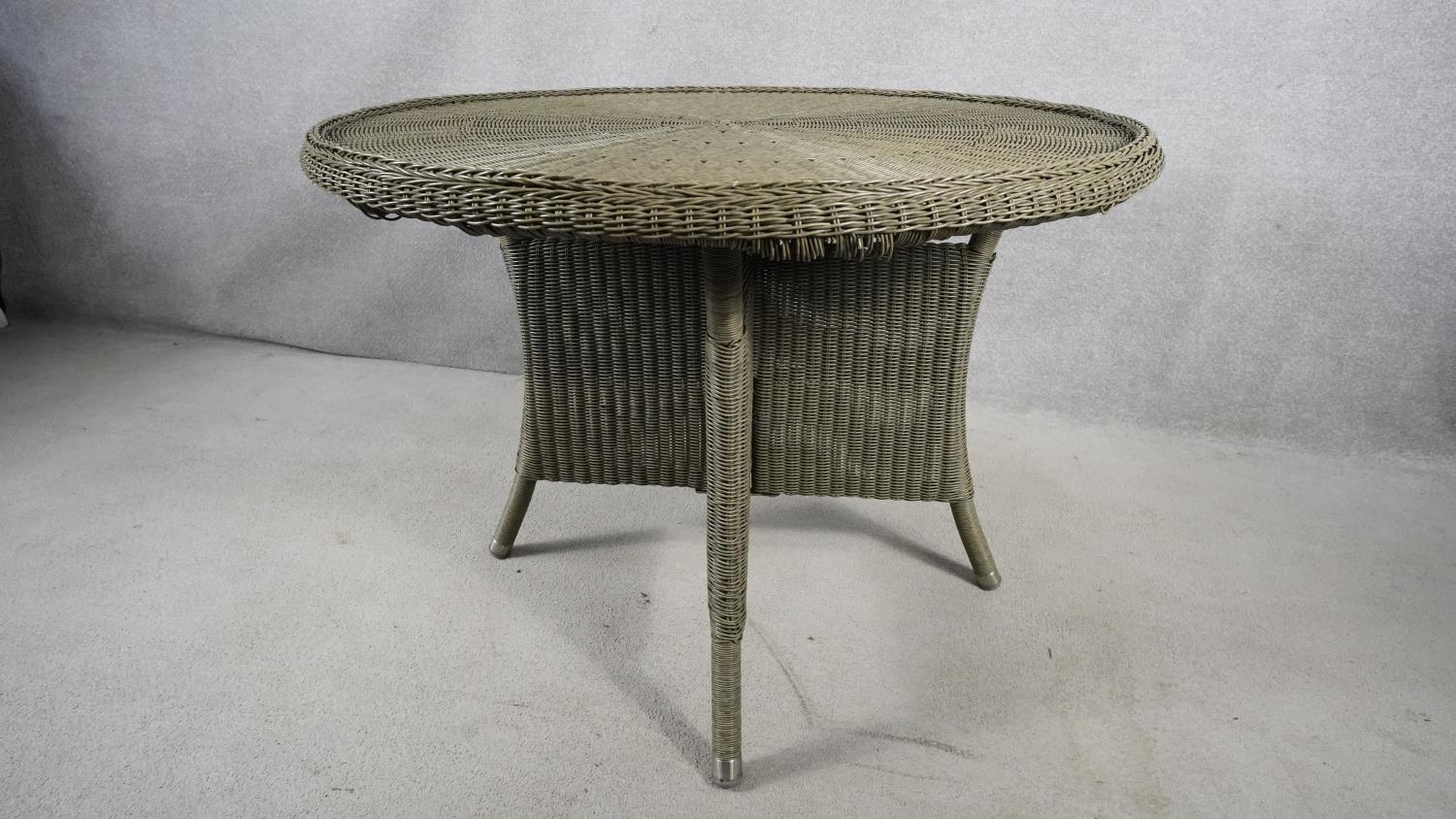 A contemporary John Lewis faux woven wicker garden table on quadruped splay supports. H.108 W.108 - Image 3 of 3