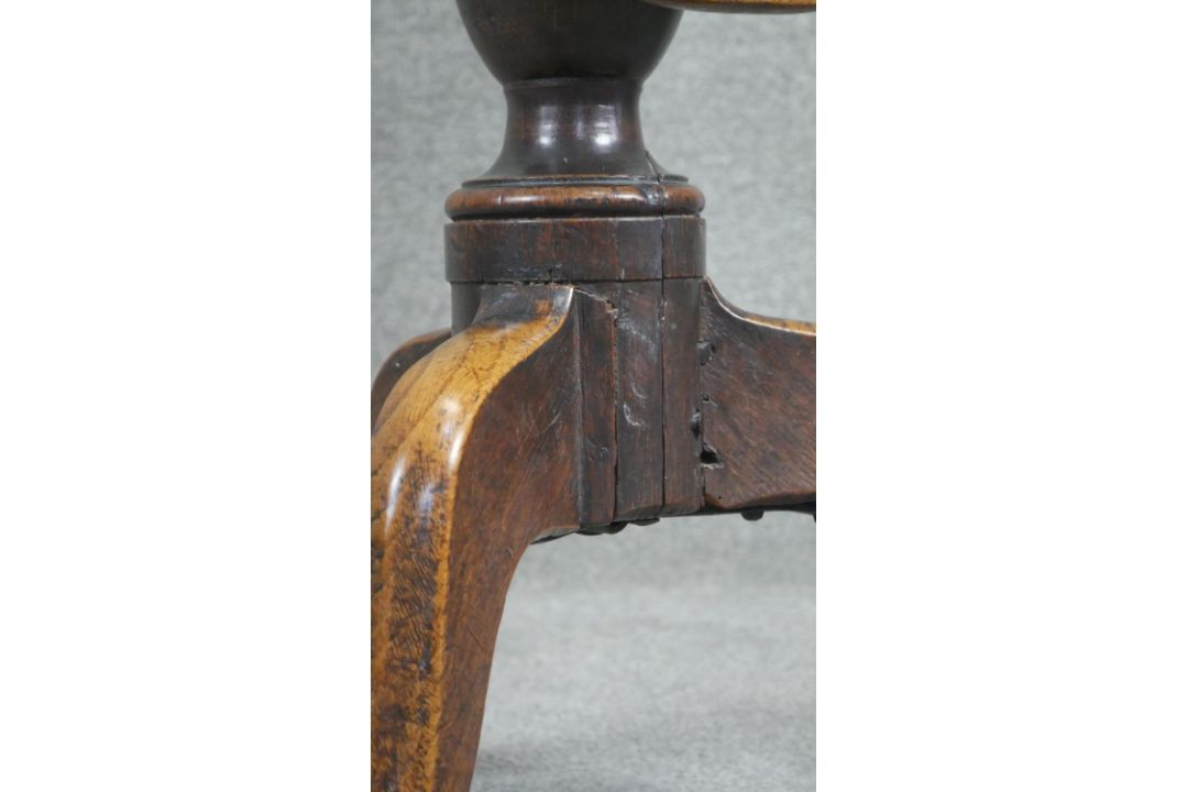 A Georgian oak tilt top table on baluster pedestal tripod supports. H.75cm (top in need of some - Image 3 of 4