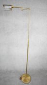 A 1970's Holtkoetter pharmacy brass floor lamp designed and made in Germany by Holtkoetter