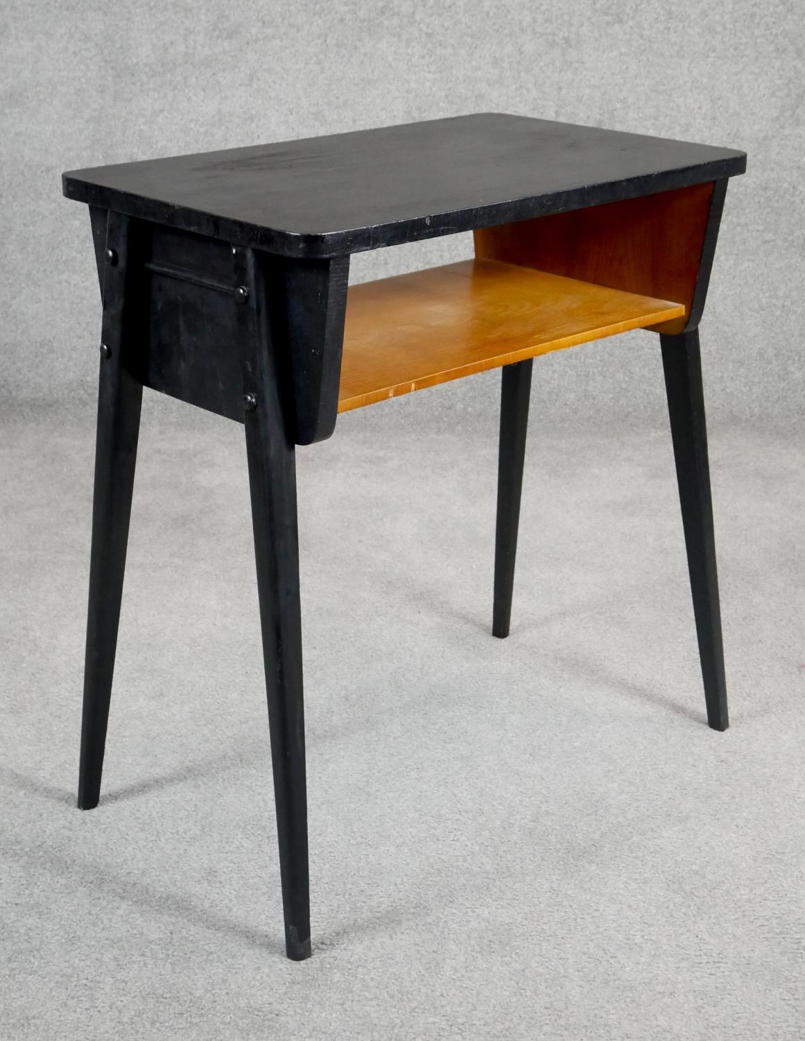 A retro vintage ebonised magazine table on splay supports. H.69 W.62 D.39cm - Image 2 of 4