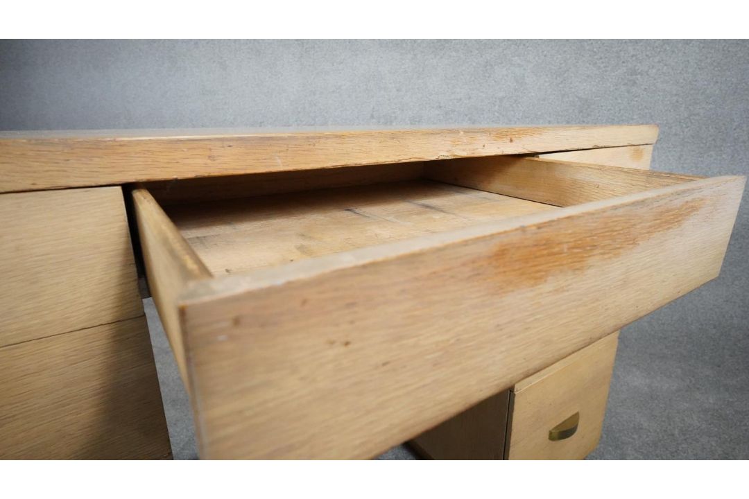A mid century vintage limed oak pedestal desk with two banks of drawers and central frieze drawer - Image 7 of 9