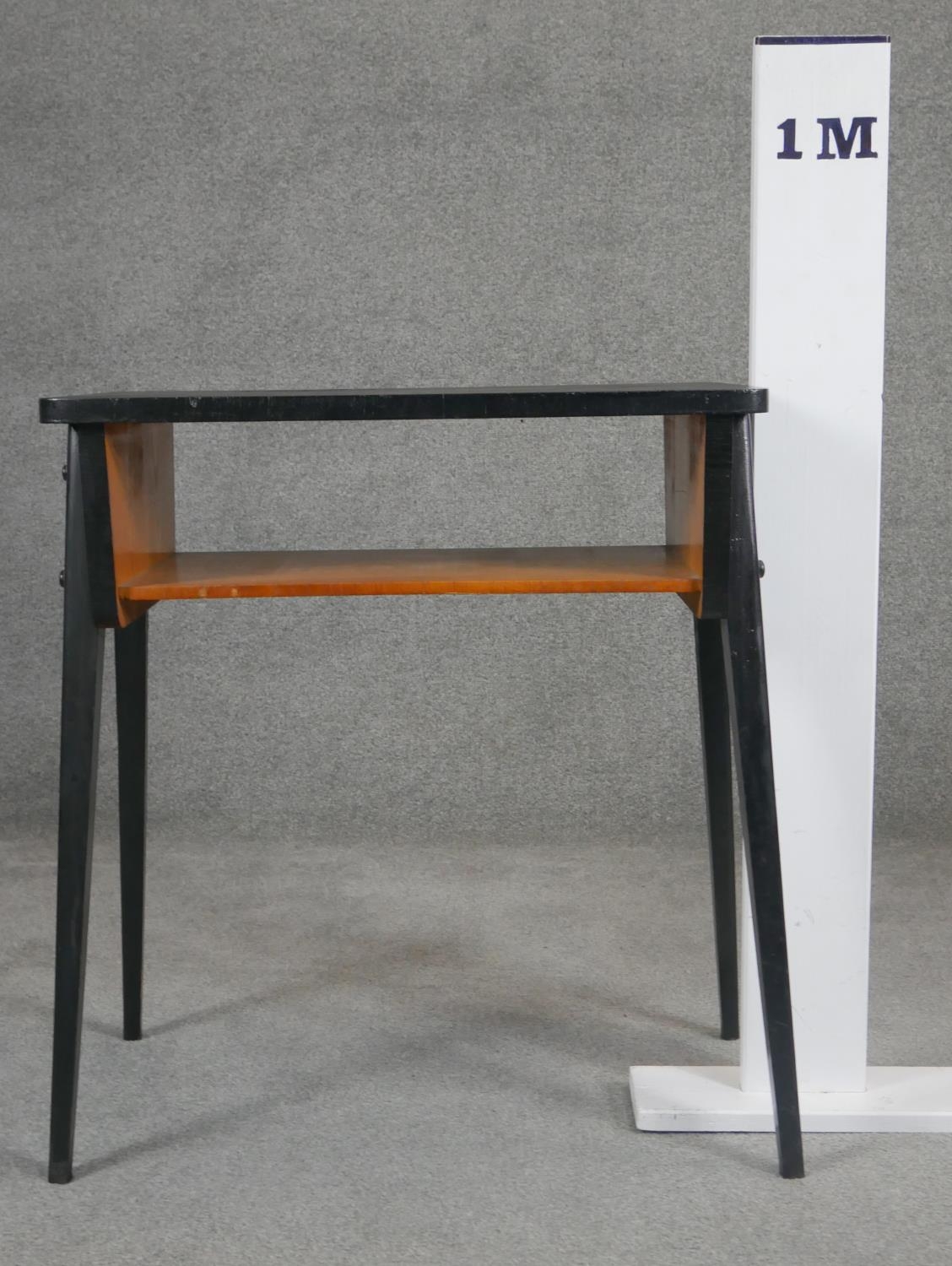 A retro vintage ebonised magazine table on splay supports. H.69 W.62 D.39cm - Image 4 of 4
