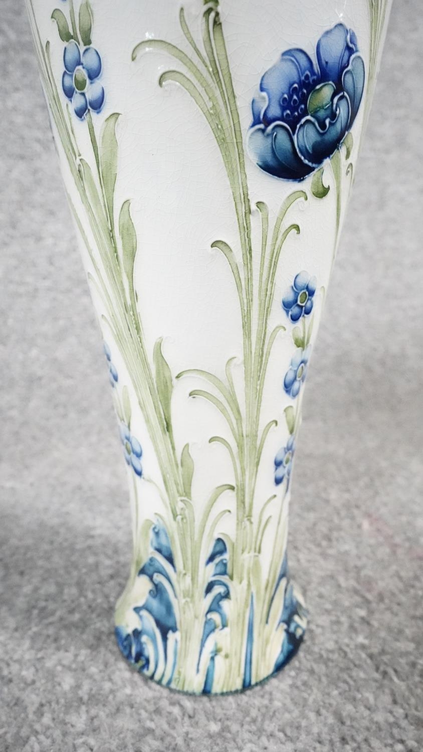 A William Moorcroft Macintyre Florian vase, tube lined with Blue Poppy pattern, of slender - Image 4 of 6