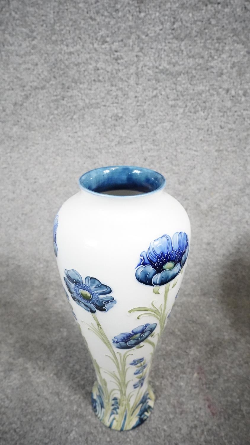 A William Moorcroft Macintyre Florian vase, tube lined with Blue Poppy pattern, of slender - Image 5 of 6