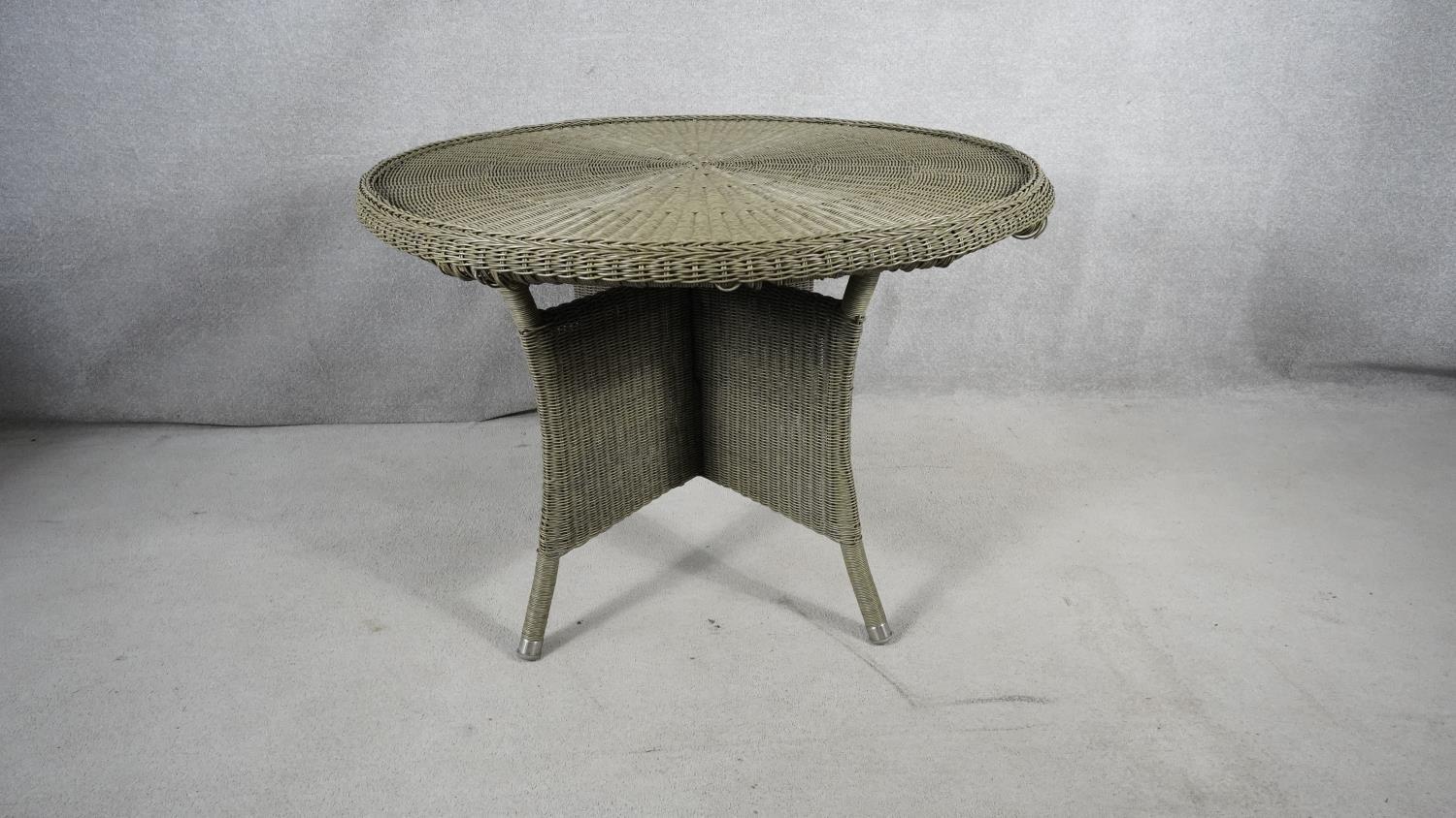 A contemporary John Lewis faux woven wicker garden table on quadruped splay supports. H.108 W.108 - Image 2 of 3
