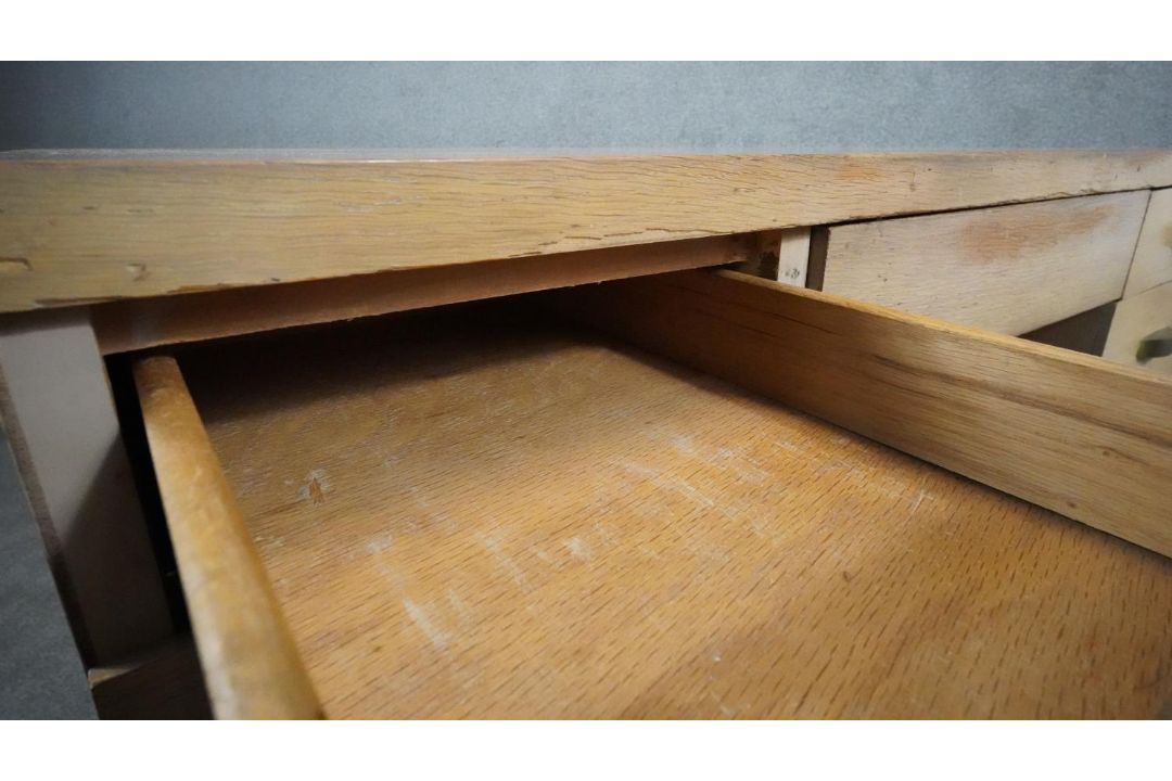 A mid century vintage limed oak pedestal desk with two banks of drawers and central frieze drawer - Image 5 of 9