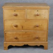 A 19th century pine chest of drawers on shaped bracket feet. H.84 W.86 D.50cm