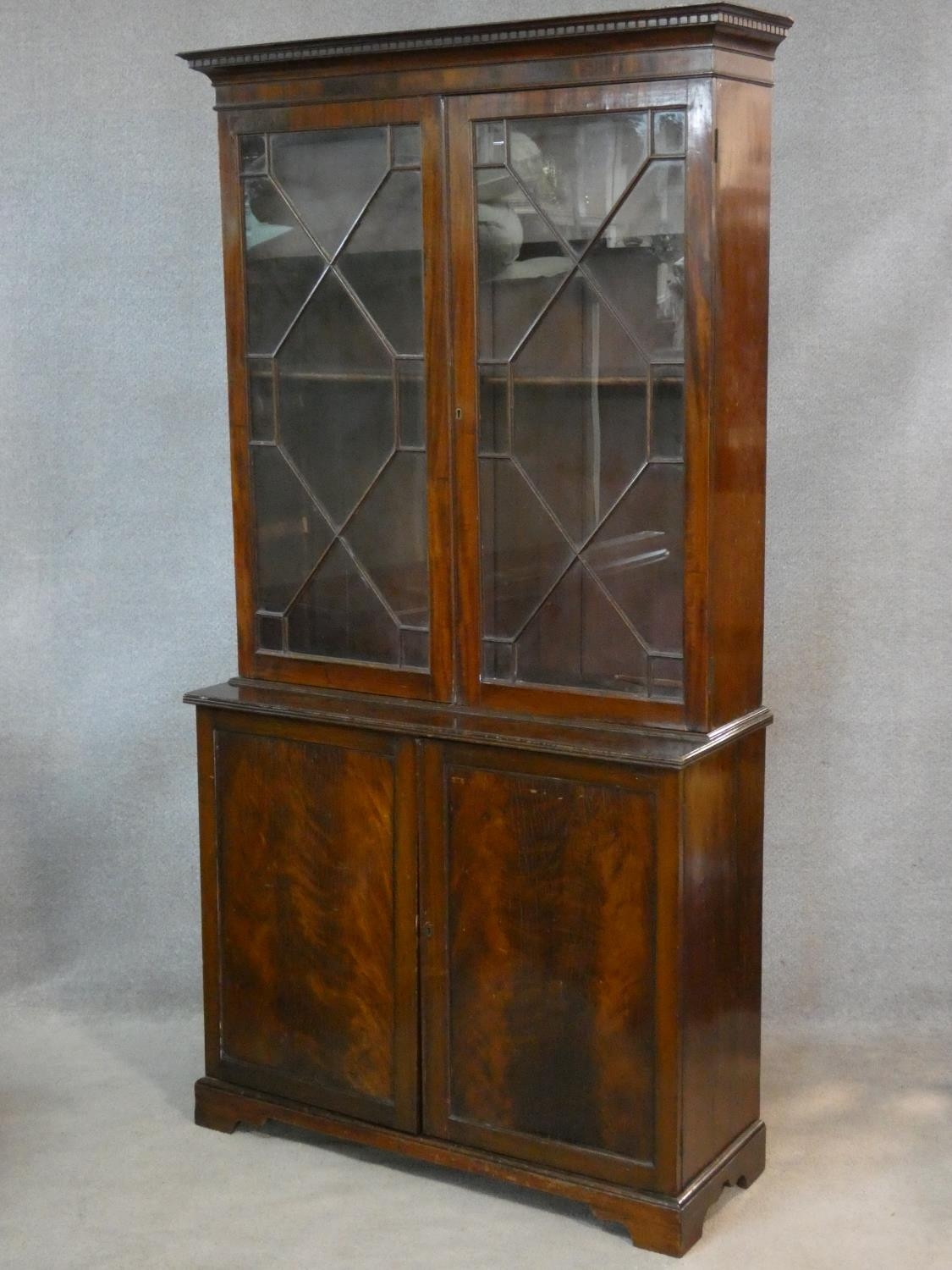 A C.1900 Georgian style library bookcase with astragal glazed doors enclosing bookshelves above - Image 2 of 5