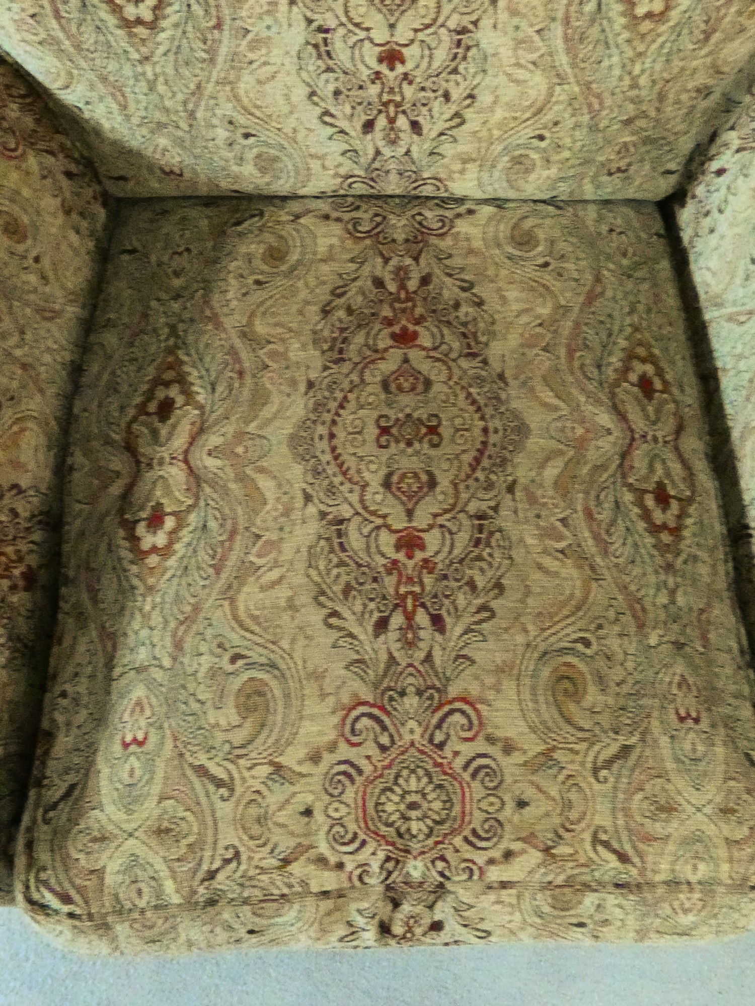 A Parker Knoll Burghley armchair in Baslow Medalli gold upholstery raised on turned tapering - Image 3 of 6