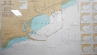 A framed and glazed map of Dover Harbour from the International Chart Series. H.76 W.108cm