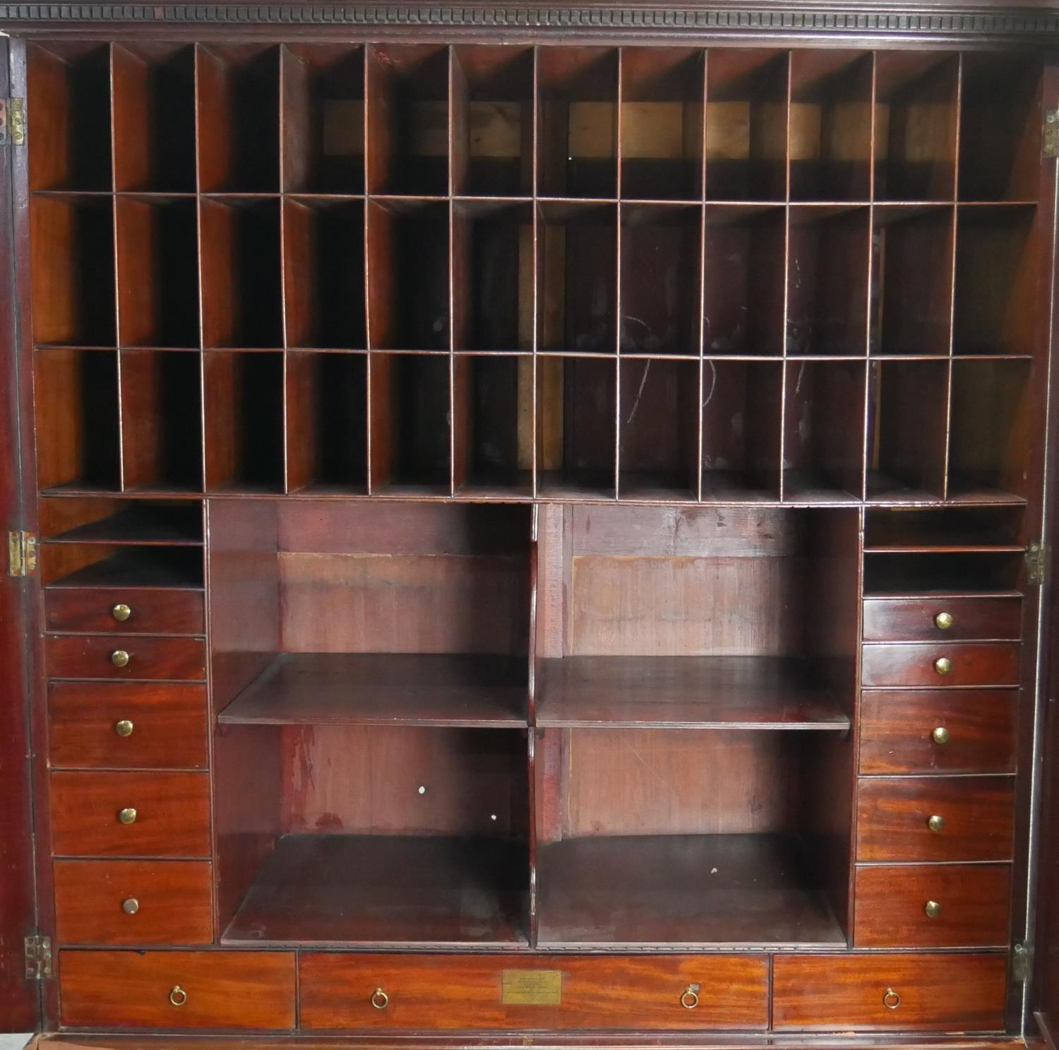 An early 19th century mahogany estate cabinet, the dentil cornice above fielded panel doors - Image 5 of 8