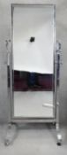 A vintage chrome framed swing frame cheval mirror on platform base with casters. H.186 W.80cm