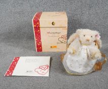 A boxed limited edition Steiff Rauschgoldengel angel teddy bear with certificate and Steiff button