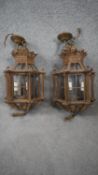 A pair of Baroque style heavy bronze and glass electric hanging lanterns. H.98cm
