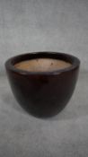 A large brown saltglaze ceramic planter. H.46 W.57cm