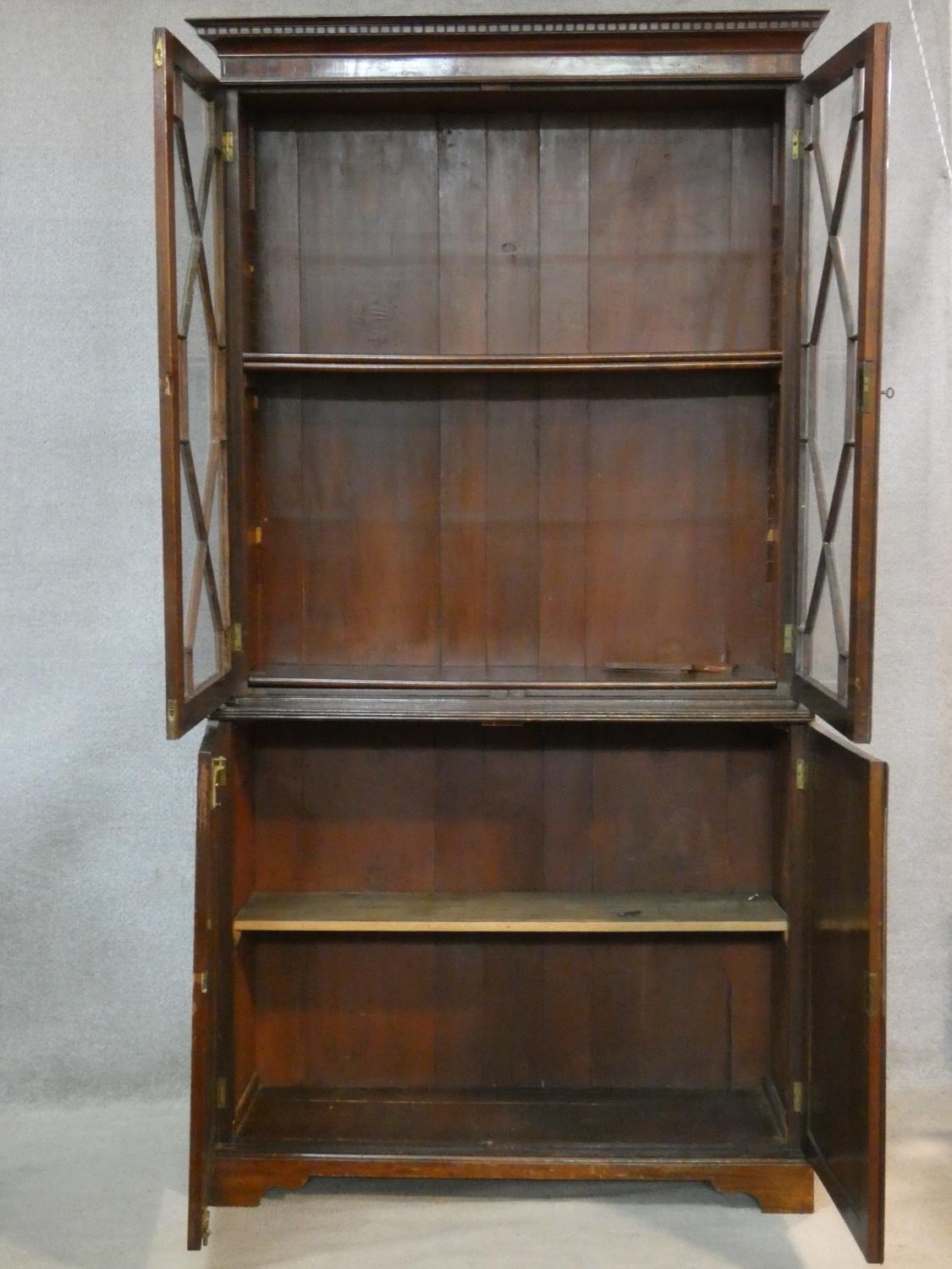 A C.1900 Georgian style library bookcase with astragal glazed doors enclosing bookshelves above - Image 3 of 5