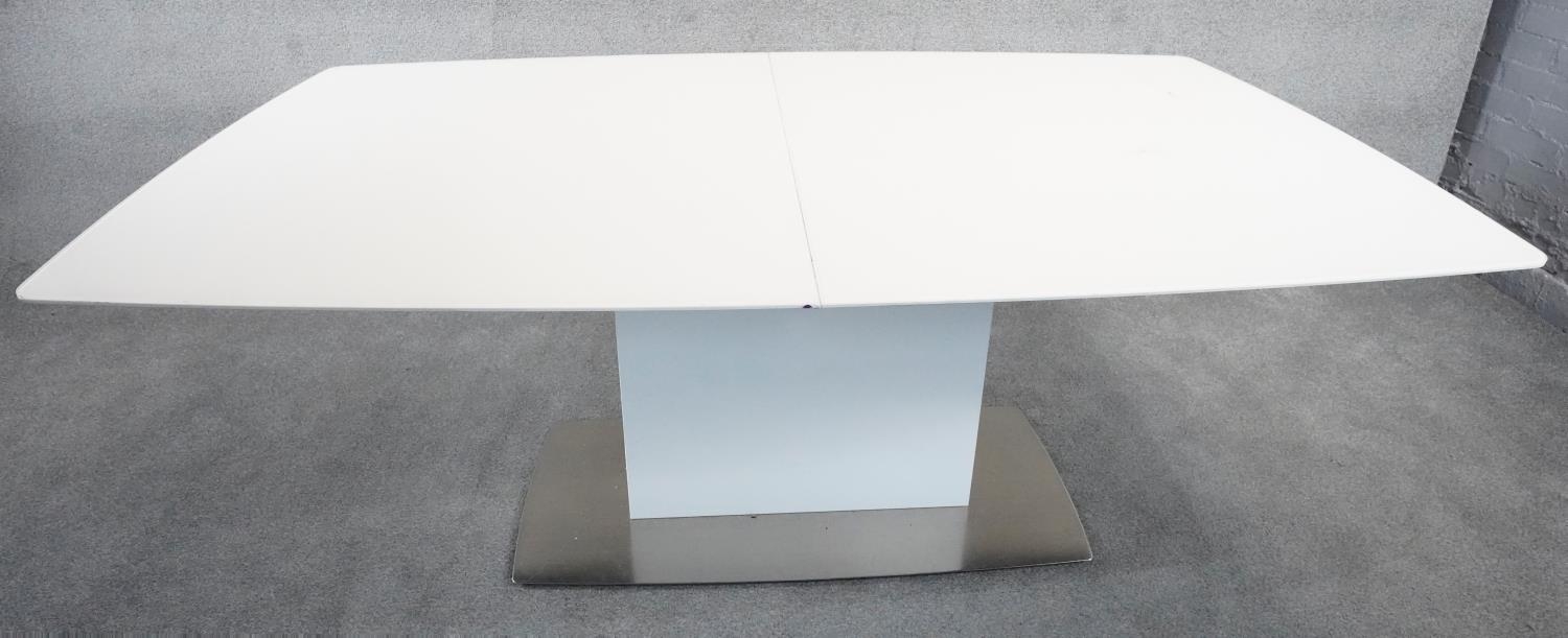 A contemporay Bo Concept extending dining room table with integral folding central leaf on - Image 2 of 6