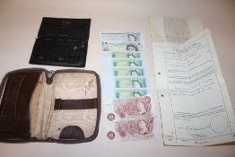 TWO VINTAGE LEATHER WALLETS CONTAINING A COLLECTION OF BRITISH BANK NOTES