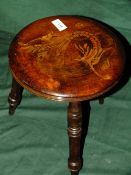 A SMALL POKERWORK STYLE 3 LEG STOOL WITH DRAGON DETAIL H-32 CM