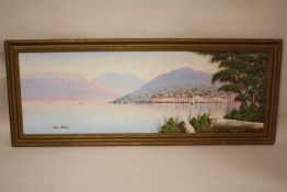 A GILT FRAMED OIL ON BOARD OF A HARBOUR SCENE AT SUNSET SIGNED PAOLO VANELLI, OVERALL SIZE INCLUDING