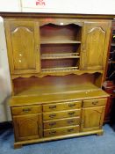 A SOLID OAK WELSH TYPE DRESSER H-199 W-156 CM