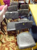 A SET OF SEVEN MODERN BLACK LEATHER STYLE DINING CHAIRS