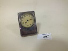 A HALLMARKED SILVER MINIATURE DESK CLOCK