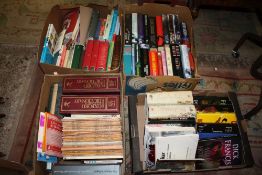 FOUR TRAYS OF MOSTLY MODERN HARD BACK BOOKS