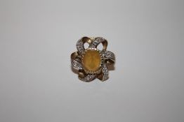 A HALLMARKED 9 CARAT GOLD DRESS RING SET WITH A CITRINE SIZE N APPROX WEIGHT - 4.8G
