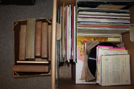 A LARGE BOX OF LP RECORDS AND SINGLES TOGETHER WITH A BOX OF VINTAGE BOOKS
