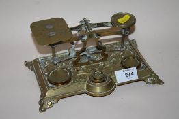 A SET OF VINTAGE BRASS POSTAGE SCALES