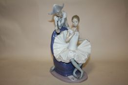 A LARGE NAO 'A DREAM COME TRUE' FIGURE OF A SEATED BALLERINA WITH A JESTER BEHIND
