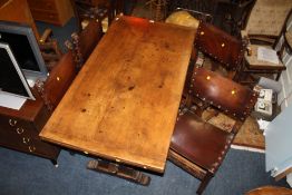 A SOLID OAK REFECTORY STYLE DRAWLEAF DINING TABLE AND 4 CHAIRS TABLE H-80 W-84 L-152 (EXTENDED L-228