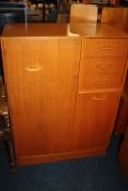 A VINTAGE OAK UTILITY TALLBOY H-120 W-87 CM WITH A GLAZED LOW BOOKCASE (2)